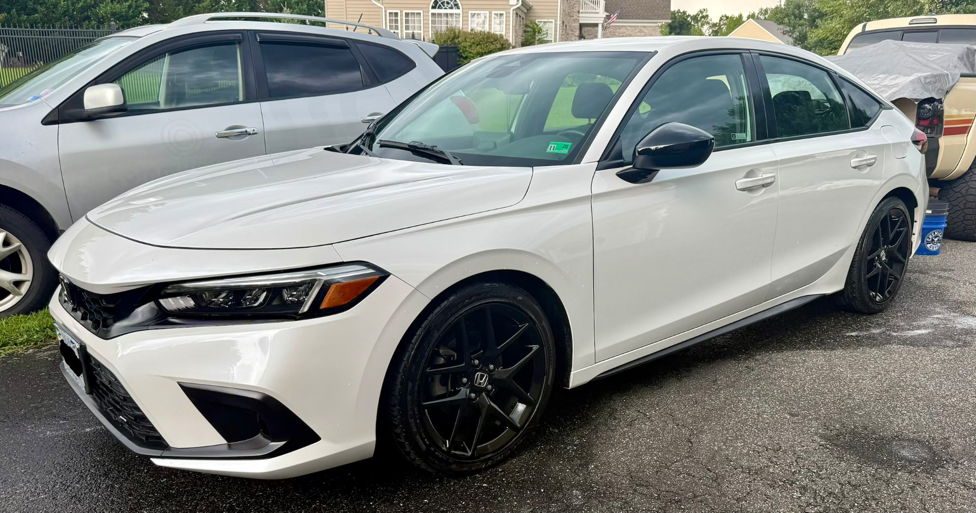 White Honda Civic Sport after a full exterior detail